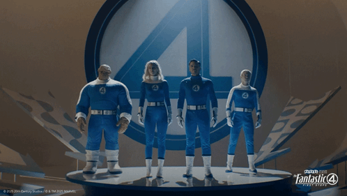 A Group Of Fantastic Four Figures Are Standing On A Stage GIF