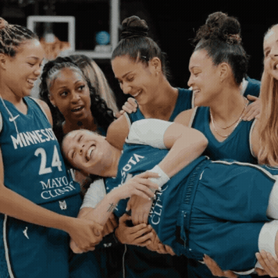 A Group Of Female Basketball Players Are Huddled Together And One Has The Number 24 On Her Jersey GIF