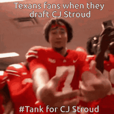 A Group Of Football Players Are Hugging Each Other With The Caption " Texans Fans When They Draft Cj Stroud GIF