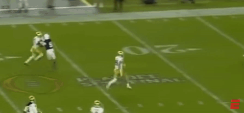 A Group Of Football Players Are Playing A Game And One Of Them Has The Number 38 On His Jersey GIF