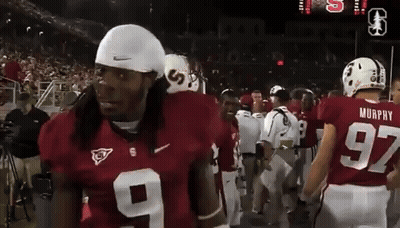 A Group Of Football Players Including Murphy Number 97 GIF