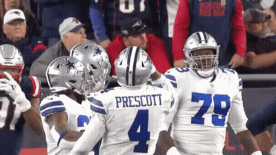 A Group Of Football Players Including One Named Prescott GIF
