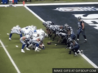 A Group Of Football Players On A Field With A Make Gifs At Gifsoup.com Logo GIF