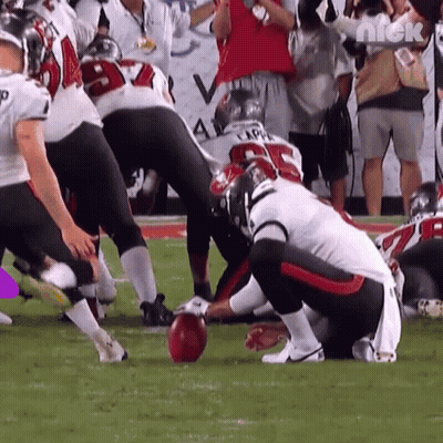 A Group Of Football Players On A Field With A Nick Logo In The Corner GIF