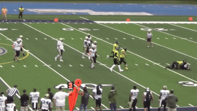 A Group Of Football Players On A Field With The Number 30 On It GIF