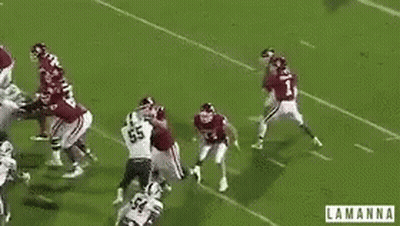 A Group Of Football Players On A Field With The Word Lamanna On The Bottom Right GIF
