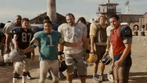 A Group Of Football Players One Of Whom Is Wearing Number 1 GIF
