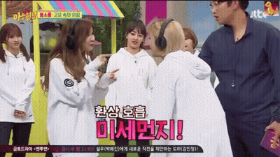 A Group Of Girls Are Standing Next To Each Other And One Of Them Is Wearing Headphones And Says ' Twice ' GIF