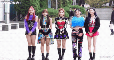 A Group Of Girls Are Standing Next To Each Other In Front Of A Building With Dispatch Written On The Bottom GIF