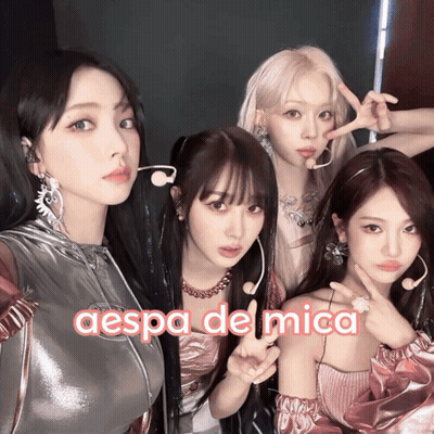 A Group Of Girls Posing For A Picture With The Words Aespa De Mica On The Bottom Right GIF