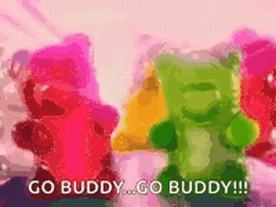 A Group Of Gummy Bears Standing Next To Each Other With The Words `` Go Buddy Go Buddy '' GIF