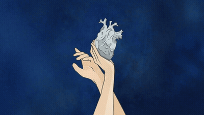 A Group Of Hands Are Reaching For A Heart GIF