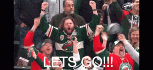A Group Of Hockey Fans Are Cheering With The Words Let 'S Go !!! GIF