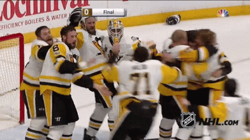 A Group Of Hockey Players Are Celebrating A Goal With Nhl.com In The Corner GIF