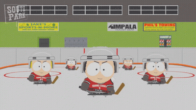 A Group Of Hockey Players Are On A Ice Rink In Front Of A Sign That Says Phil 'S Towing GIF