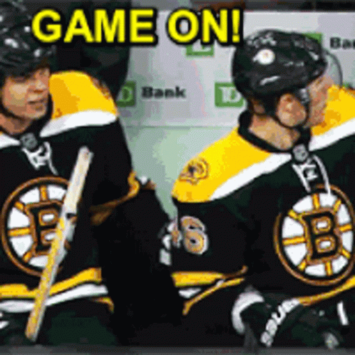 A Group Of Hockey Players Are Sitting On The Ice With The Words Game On Behind Them GIF