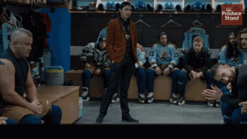 A Group Of Hockey Players In A Locker Room With The Words Yeah-Ooh Written On The Bottom GIF