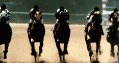 A Group Of Horses Are Racing On A Track And The Year 2021 Is Visible GIF