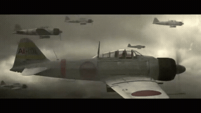 A Group Of Japanese Fighter Jets Are Flying In The Sky . GIF