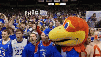 A Group Of Kansas Basketball Players Are Celebrating Their Win GIF