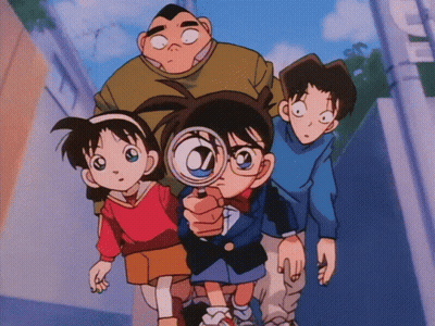 A Group Of Kids Are Looking Through A Magnifying Glass And One Of Them Is Holding A Magnifying Glass GIF