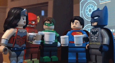A Group Of Lego Superheroes Standing Around Drinking Coffee GIF