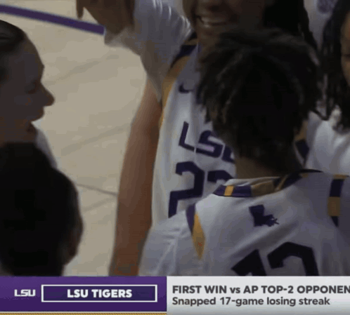 A Group Of Lsu Tigers Basketball Players Huddle Together GIF