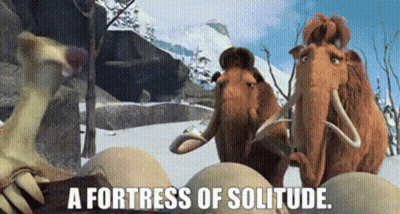 A Group Of Mammoths Standing Next To Each Other With The Words A Fortress Of Solitude Written Below Them . GIF
