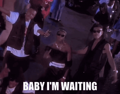 A Group Of Men Are Dancing In A Crowd With The Words Baby I 'M Waiting Above Them GIF