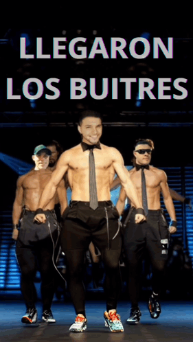 A Group Of Men Are Dancing In Front Of A Sign That Says Llegaron Los Butres GIF