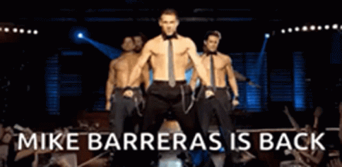 A Group Of Men Are Dancing On A Stage And The Caption Says Mike Barreras Is Back . GIF