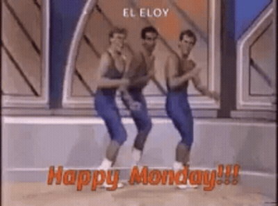 A Group Of Men Are Dancing On A Stage With The Words `` Happy Monday '' . GIF