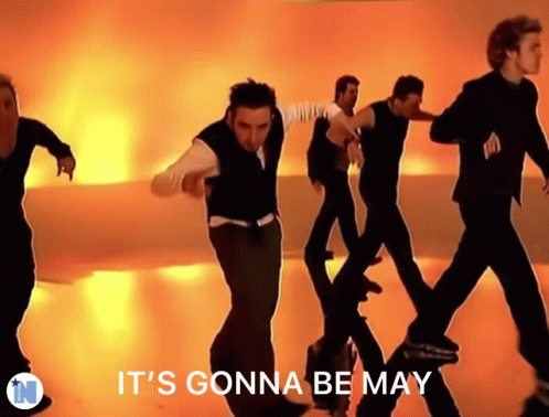 A Group Of Men Are Dancing With The Words It 'S Gonna Be May GIF