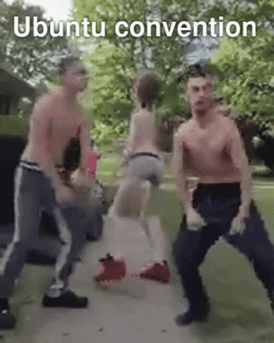 A Group Of Men Are Dancing With The Words Ubuntu Convention Above Them GIF