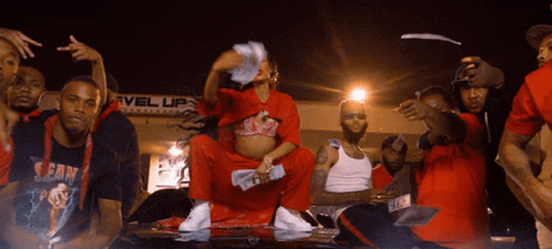 A Group Of Men Are Gathered In Front Of A Level Up Sign GIF