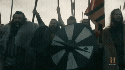 A Group Of Men Are Holding Spears And Shields And The Word History Is On The Bottom Of The Screen GIF