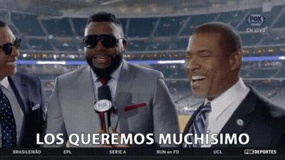 A Group Of Men Are Laughing With The Words Los Queremos Muchisimo On The Bottom GIF