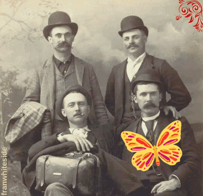 A Group Of Men Are Posing For A Photo With A Butterfly On Their Shoulder GIF