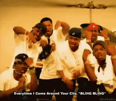 A Group Of Men Are Posing For A Picture With The Words Everytime I Come Around Your City Bling Bling GIF