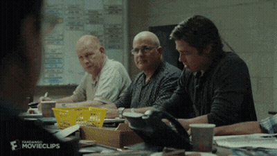 A Group Of Men Are Sitting Around A Table With Movieclips Written On The Bottom Right Corner Of The Screen GIF