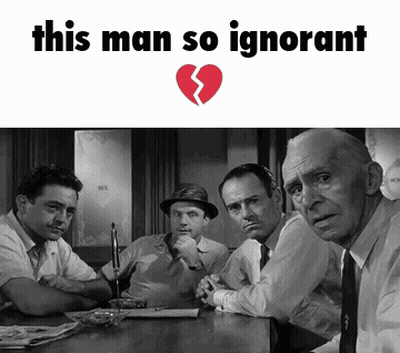 A Group Of Men Are Sitting At A Table With A Broken Heart Above Them That Says " This Man So Ignorant " GIF