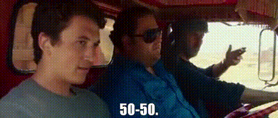 A Group Of Men Are Sitting In A Car And One Of Them Is Talking On His Cell Phone . GIF