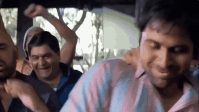 A Group Of Men Are Sitting In A Car Laughing And Dancing . GIF