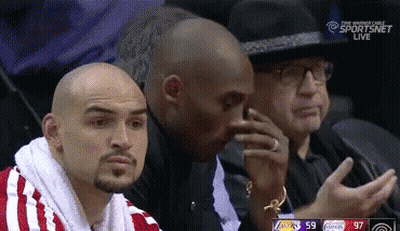 A Group Of Men Are Sitting In A Stadium Watching A Basketball Game On Sportsnet Live GIF