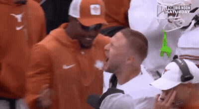 A Group Of Men Are Sitting In A Stadium Watching A Football Game On Fox Big Moon Saturday GIF