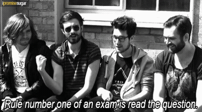 A Group Of Men Are Sitting Next To Each Other With The Words Rule Number One Of An Exam Is Read The Question GIF