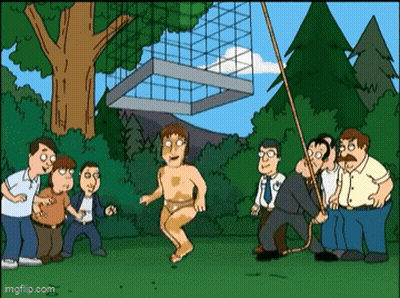 A Group Of Men Are Standing Around A Man In A Bathing Suit . GIF