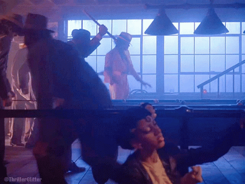 Men Around Pool Table With Thriller Glitter GIF