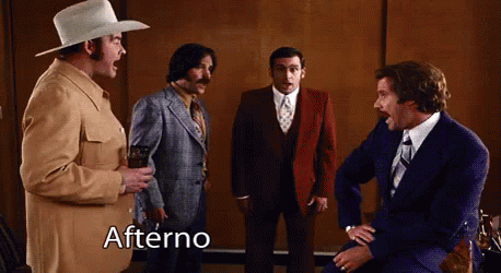 A Group Of Men Are Standing Around Talking And The Word Afterno Is On The Bottom Left GIF