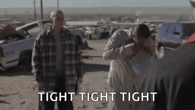 A Group Of Men Are Standing In A Field With The Words `` Tight Tight Tight '' In The Foreground . GIF